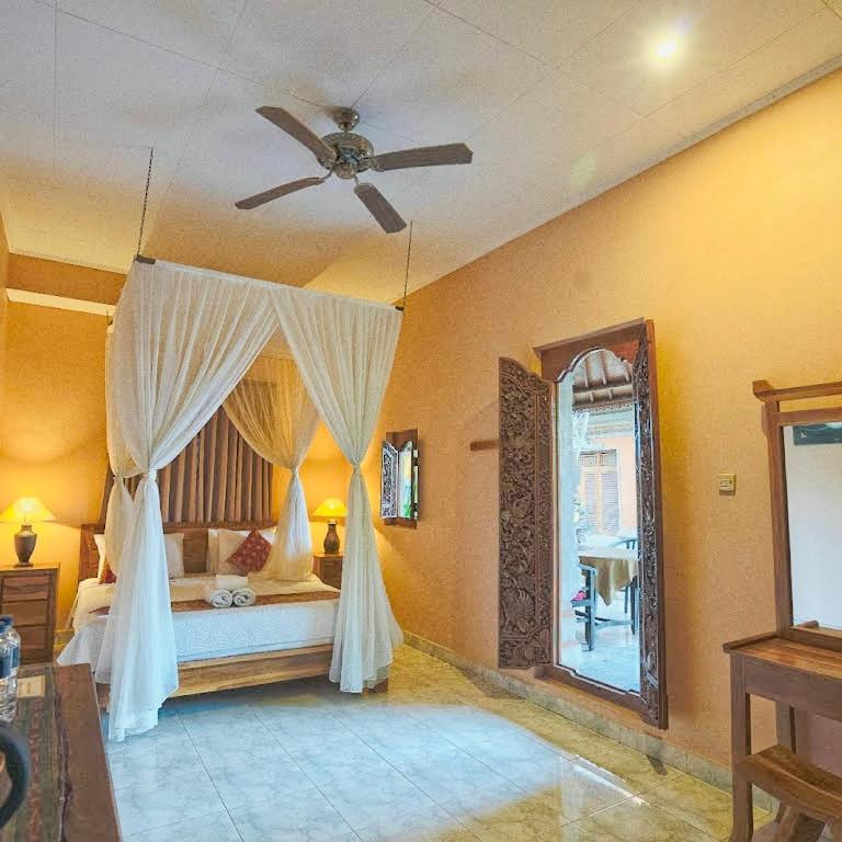 Aura Bisma Guesthouse อูบุด ภายนอก รูปภาพ
